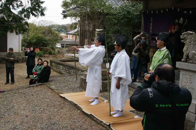 弓引き